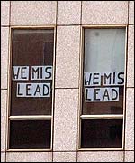 Protest banners posted on the windows of the Rembrandt Tower